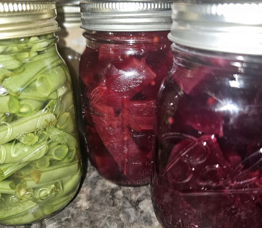 Jars of green beans and beets