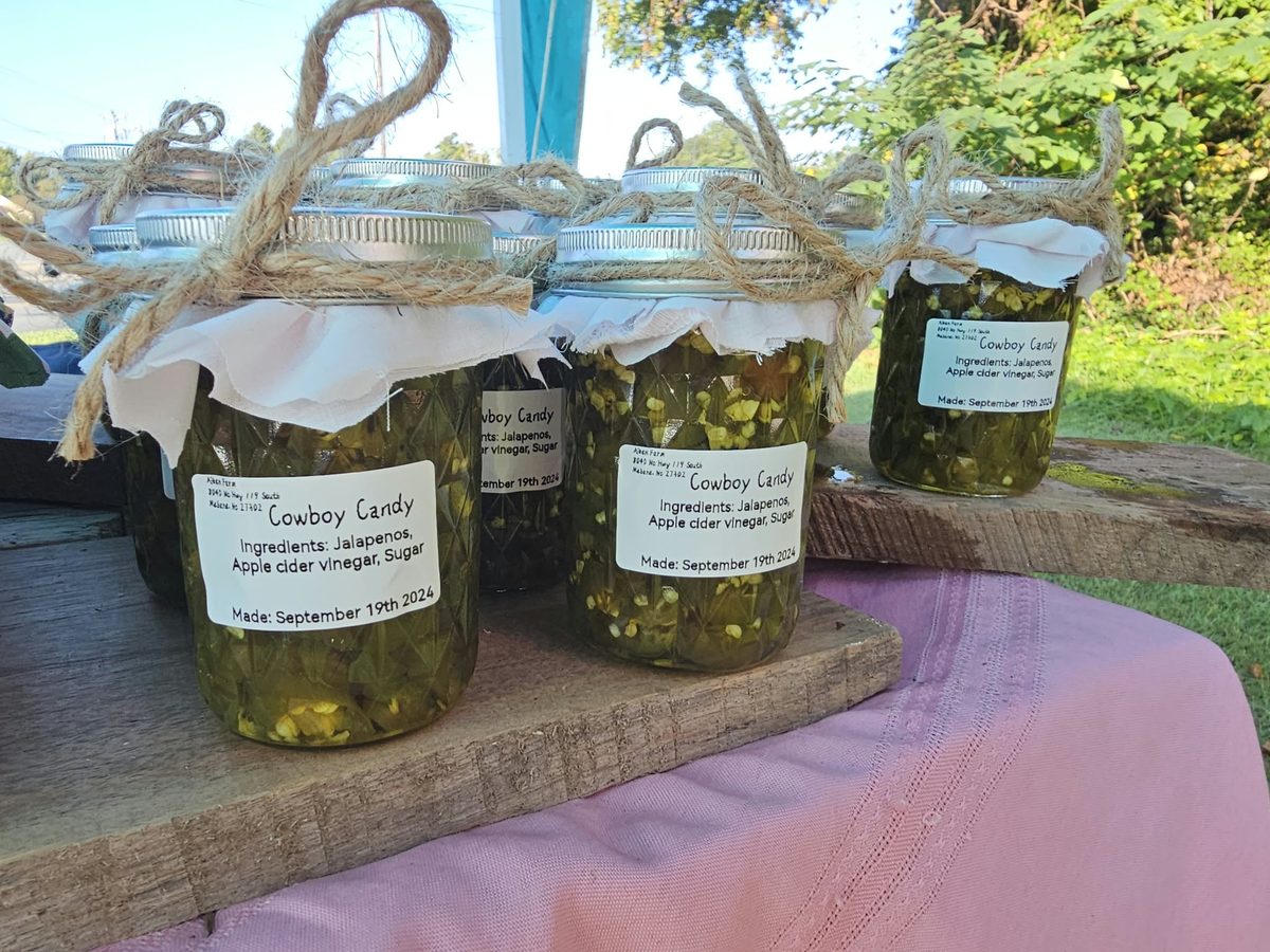 Jars of Cowboy Candy tied with twine